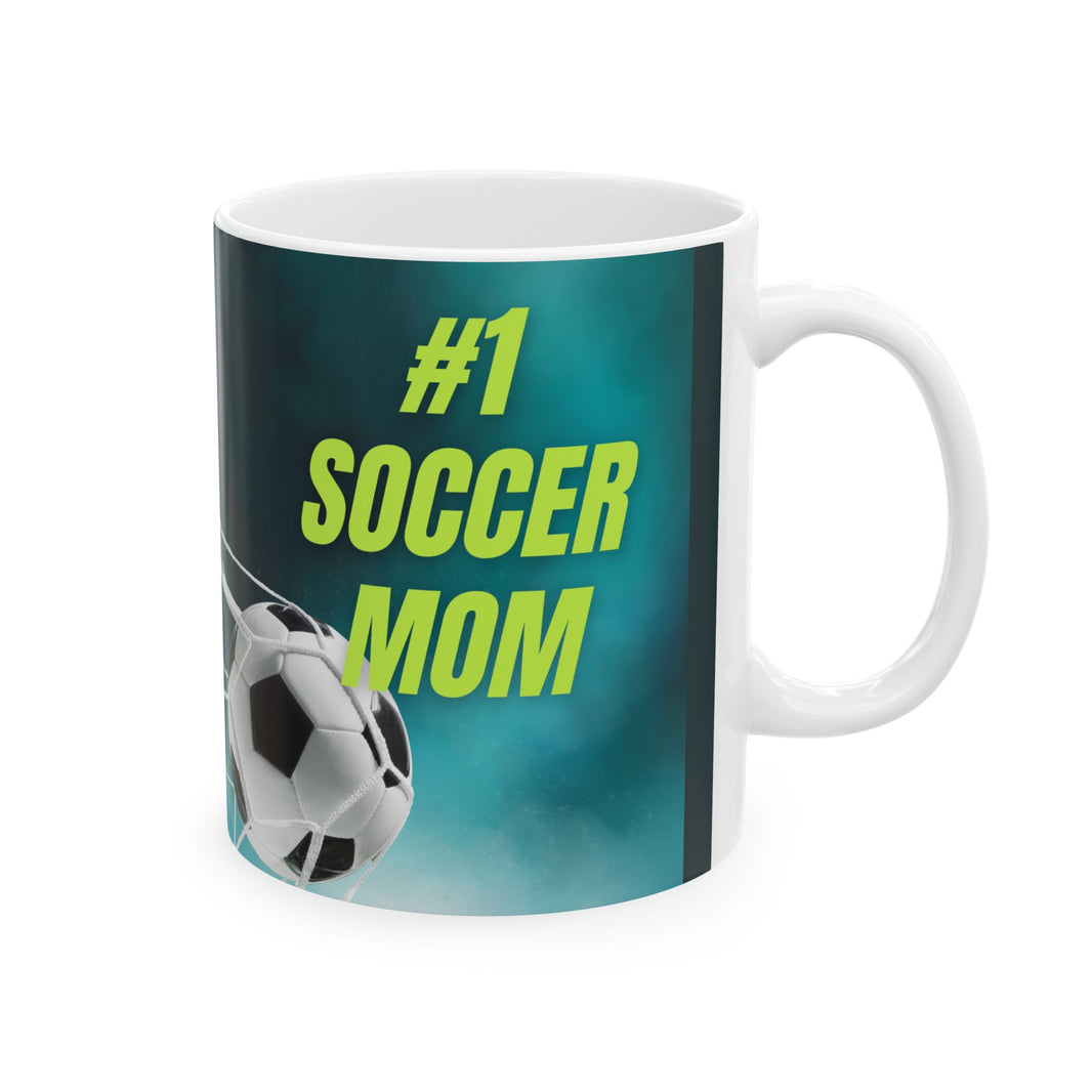 Mug with '#1 Soccer Mom' text and soccer ball design on a teal background
