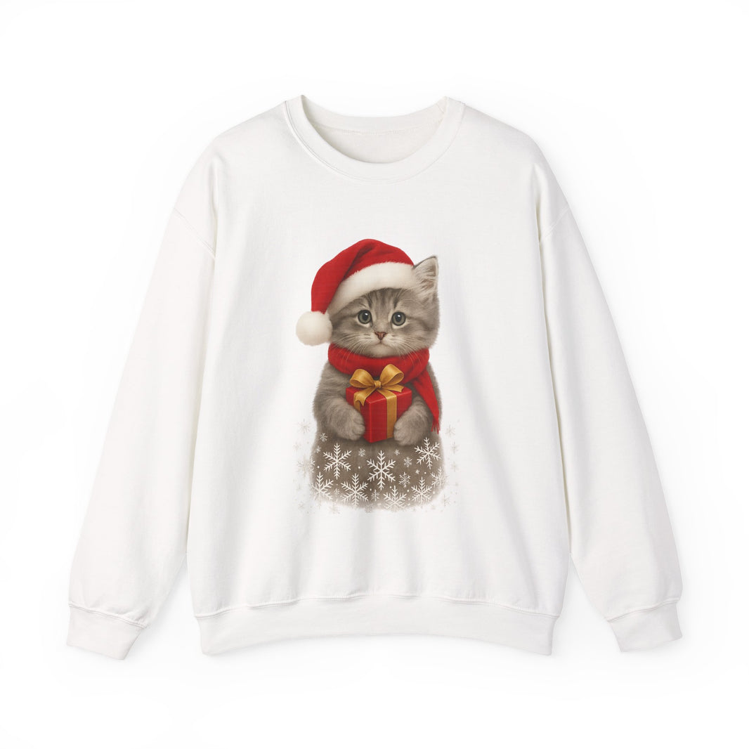 White sweatshirt featuring a gray kitten wearing a Santa hat and red scarf, holding a small red gift box with a gold bow, surrounded by snowflake designs.