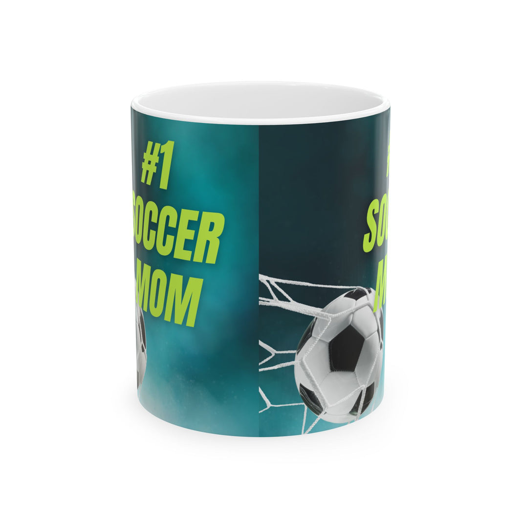 Mug with '#1 Soccer Mom' text and soccer ball design on a teal background