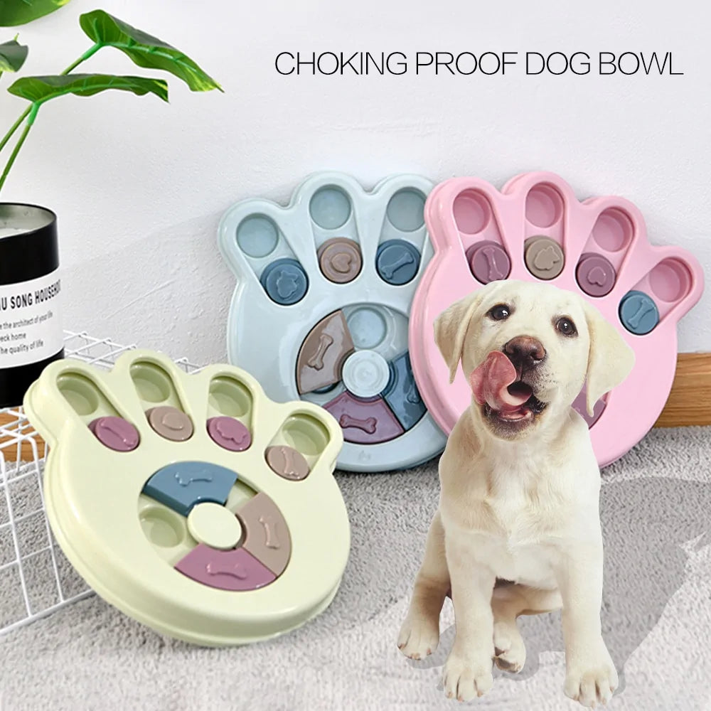 a pastel-colored paw-shaped puzzle toy - uncover kibble stored beneath the sliders.