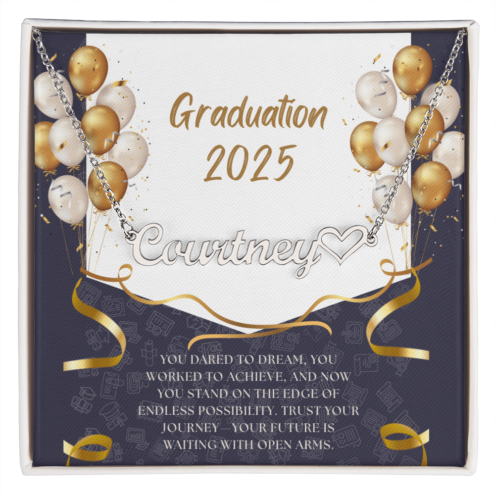 Close-up of hands holding an open red gift box featuring a personalized gold name necklace with heart, set against a message card that reads "Graduation 2025" and includes an inspiring graduation quote, with gold and white balloons in the background.