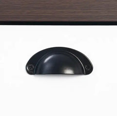 Black cabinet handle on a white background
