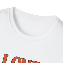 Close-up of a white shirt with red text on a white background