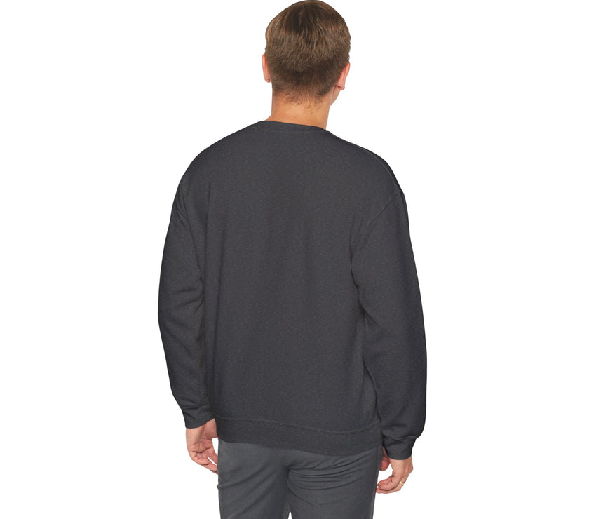 Man wearing a dark gray sweatshirt and pants on a white background