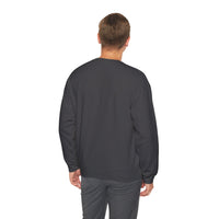 Man wearing a dark gray sweatshirt and pants on a white background