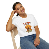 Person wearing a white t-shirt with a dog graphic and text, sitting on a chair.