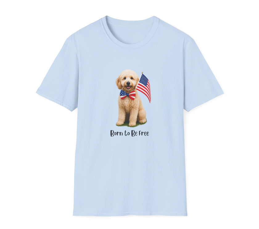 T-shirt featuring a cute golden doodle puppy wearing an American flag bow tie and holding a small U.S. flag, with the phrase 'Born to Be Free' printed below the image.