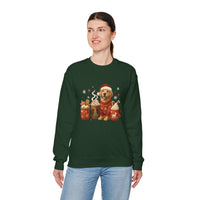 Person wearing a green sweatshirt with a Christmas-themed design of a dog and gingerbread men.