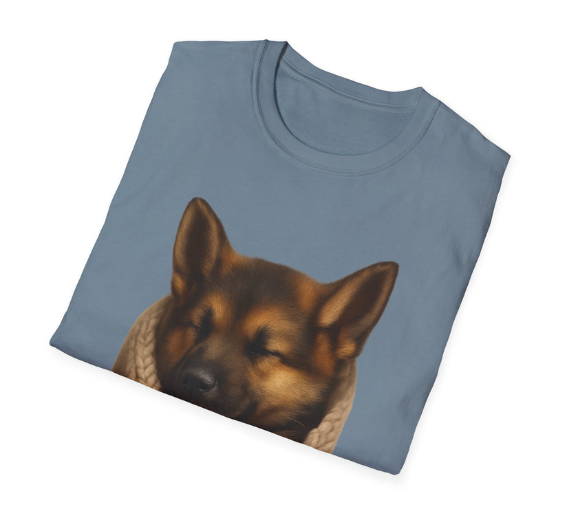 Folded blue t-shirt with a dog graphic on a white background