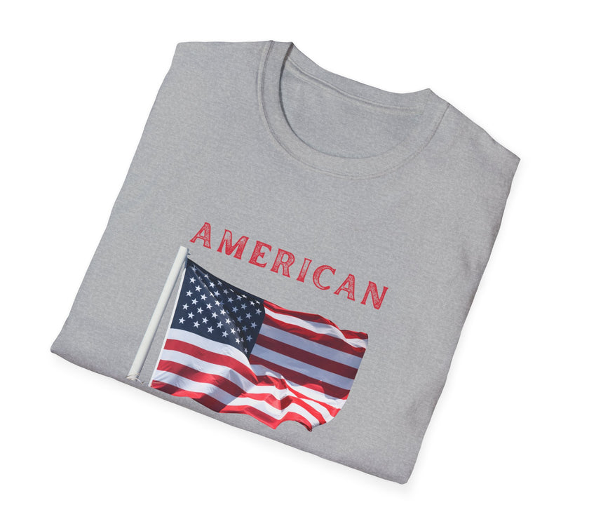 T-shirt featuring an American flag graphic with the words 'AMERICAN DREAM' in red and blue text above and below the flag