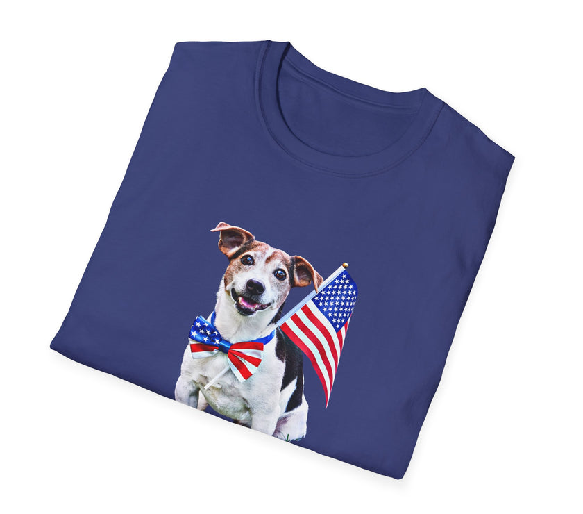 Folded T-shirt featuring a cute  puppy wearing an American flag bow tie and holding a small U.S. flag, with the phrase 'Born to Be Free' printed below the image.