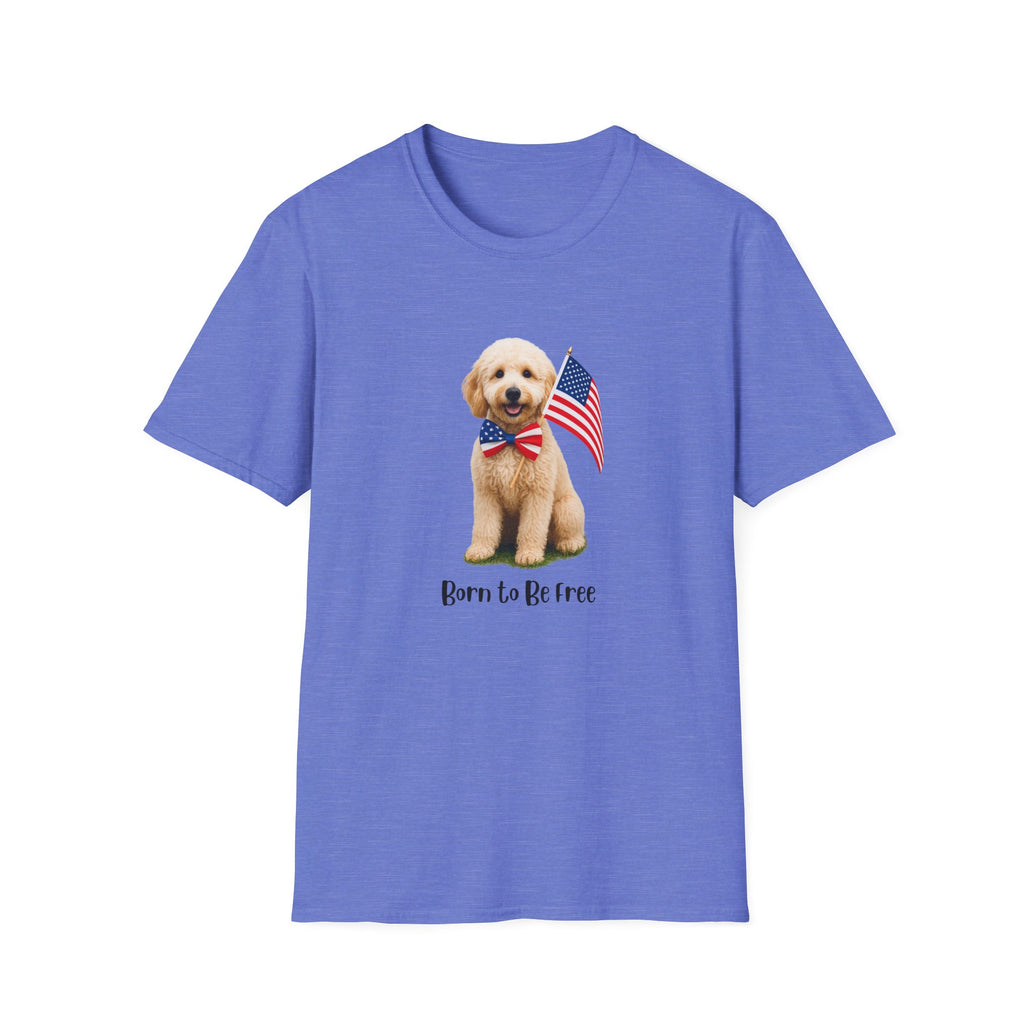 Blue t-shirt featuring a cute golden doodle puppy wearing an American flag bow tie and holding a small U.S. flag, with the phrase 'Born to Be Free' printed below the image.