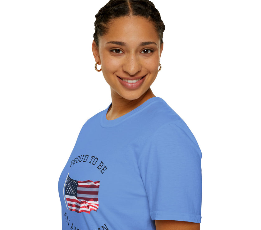 Smiling woman  wearing a white t-shirt with an American flag graphic and the words 'Proud to Be an American' printed around the flag