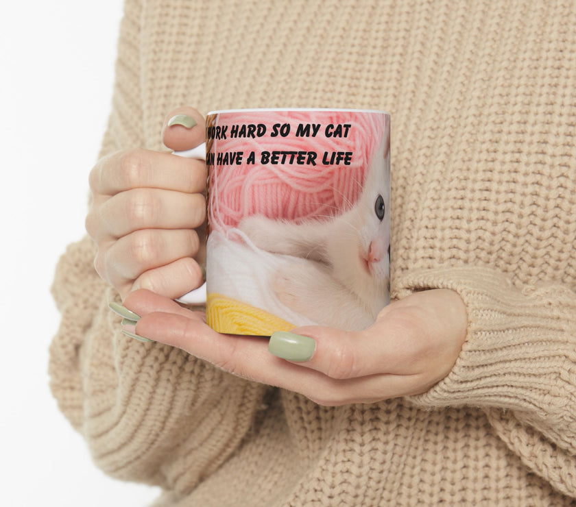 Whiskers & Work Mug –Kitten with Yarn Coffee Cup with message “I work hard so my cat can have a better life.”
