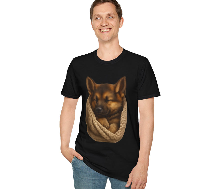 Person wearing a black t-shirt with a dog graphic on a white background