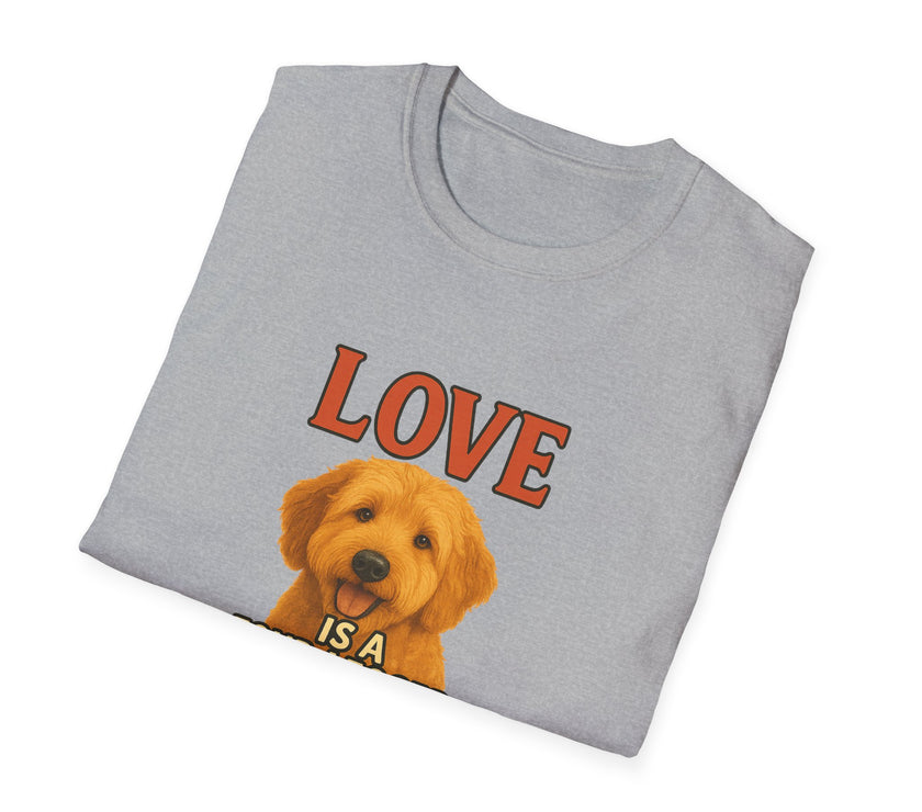 Folded gray t-shirt with a dog illustration and 'LOVE IS A' text on a white background