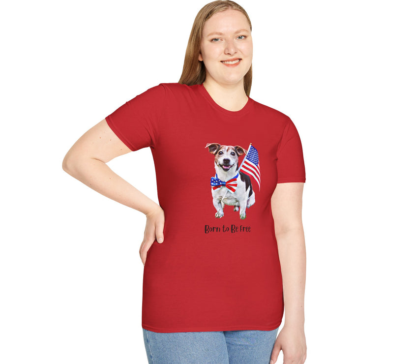 Female wearing T-shirt featuring a cute  puppy wearing an American flag bow tie and holding a small U.S. flag, with the phrase 'Born to Be Free' printed below the image.
