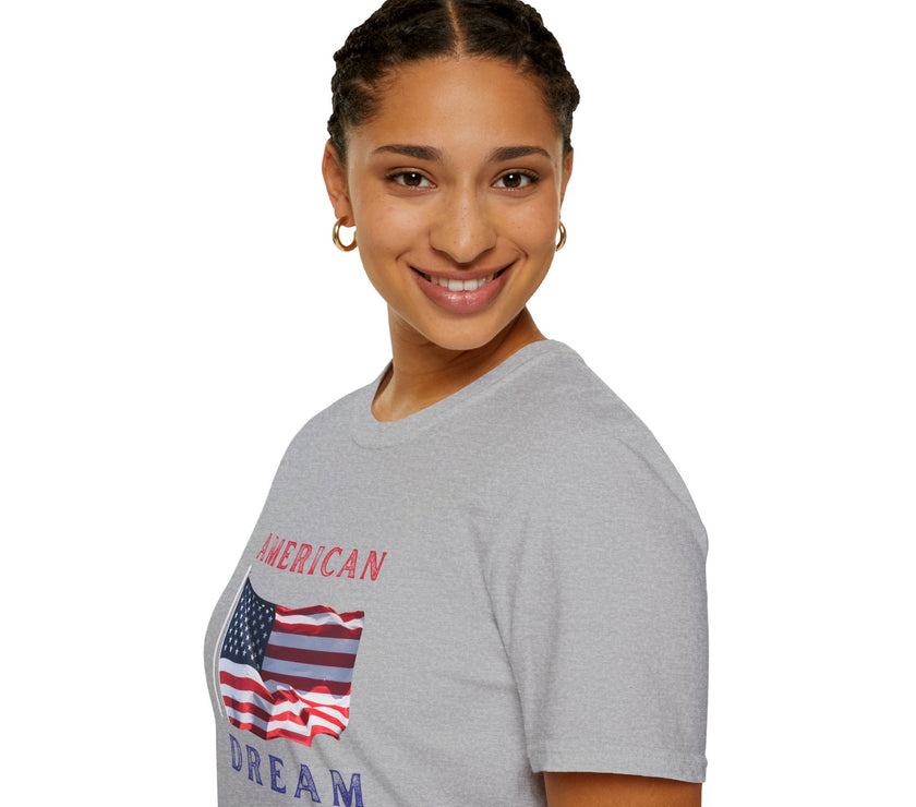 Female wearing T-shirt featuring an American flag graphic with the words 'AMERICAN DREAM' in red and blue text above and below the flag