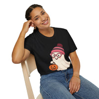 Person wearing a black t-shirt with a ghost design holding a pumpkin, sitting on a chair.