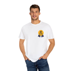 White t-shirt featuring a yellow and navy blue award ribbon graphic on the chest with the text "#1 Dad," designed as a fun and heartfelt Father's Day gift.