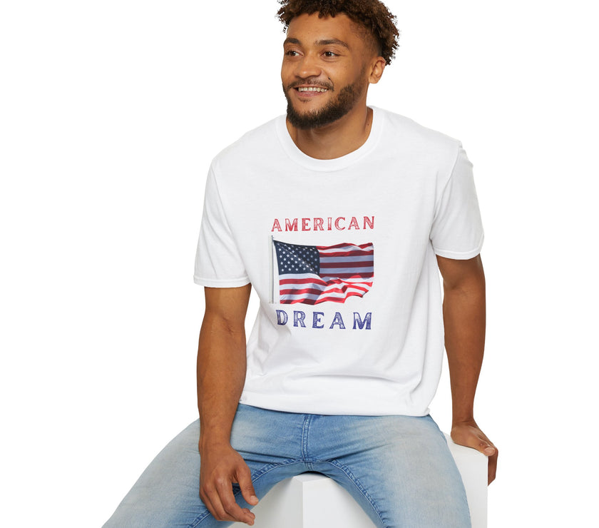 Male wearing T-shirt featuring an American flag graphic with the words 'AMERICAN DREAM' in red and blue text above and below the flag