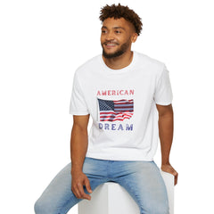 Male wearing T-shirt featuring an American flag graphic with the words 'AMERICAN DREAM' in red and blue text above and below the flag
