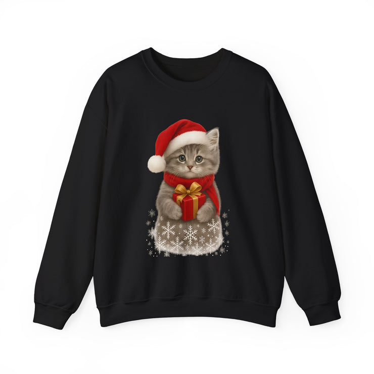 Black sweatshirt featuring a gray kitten wearing a Santa hat and red scarf, holding a small red gift box with a gold bow, surrounded by snowflake designs.