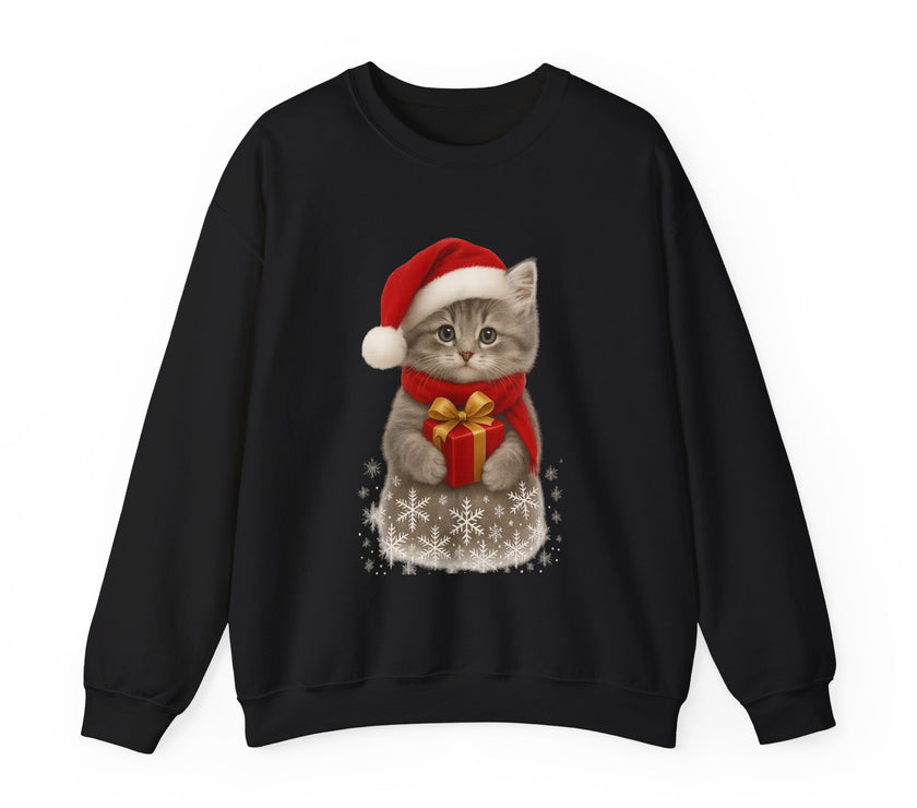 Black sweatshirt featuring a gray kitten wearing a Santa hat and red scarf, holding a small red gift box with a gold bow, surrounded by snowflake designs.