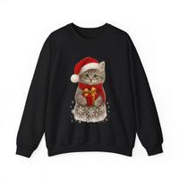 Black sweatshirt featuring a gray kitten wearing a Santa hat and red scarf, holding a small red gift box with a gold bow, surrounded by snowflake designs.