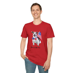 Male wearing T-shirt featuring a cute golden doodle puppy wearing an American flag bow tie and holding a small U.S. flag, with the phrase 'Born to Be Free' printed below the image.