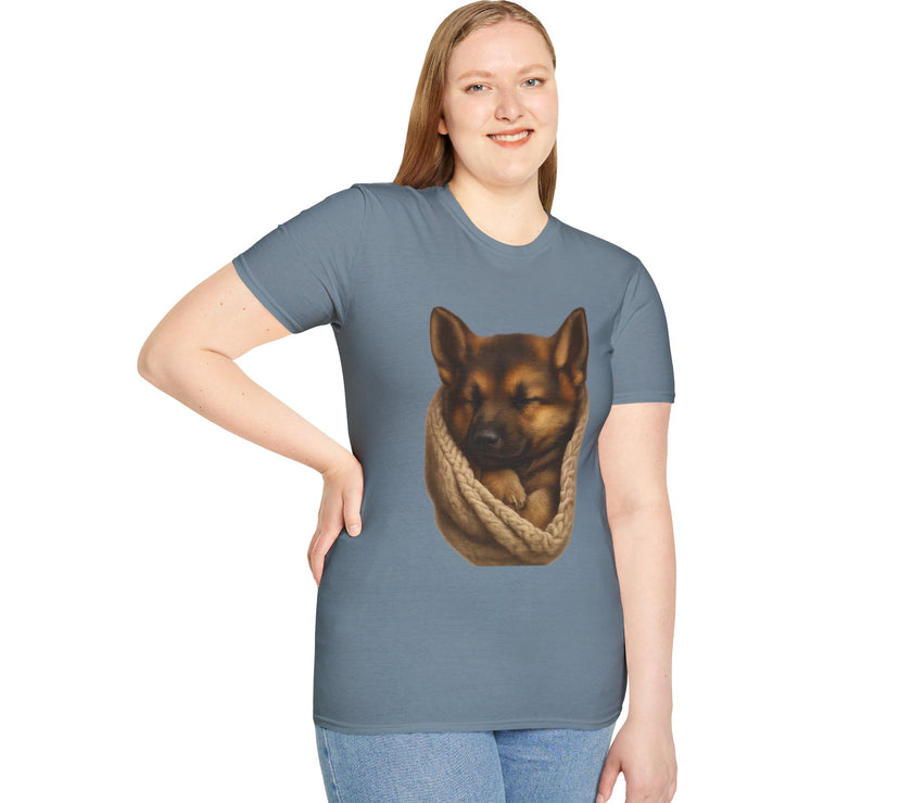 Person wearing a gray t-shirt with a graphic of a dog in a knitted pouch on a white background