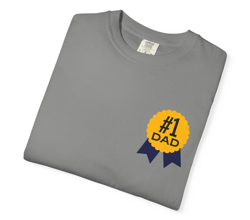 Gray t-shirt featuring a yellow and navy blue award ribbon graphic on the chest with the text "#1 Dad," designed as a fun and heartfelt Father's Day gift.

