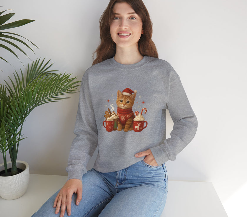 Woman wearing a gray sweater with a cat design, sitting in a room with a plant.