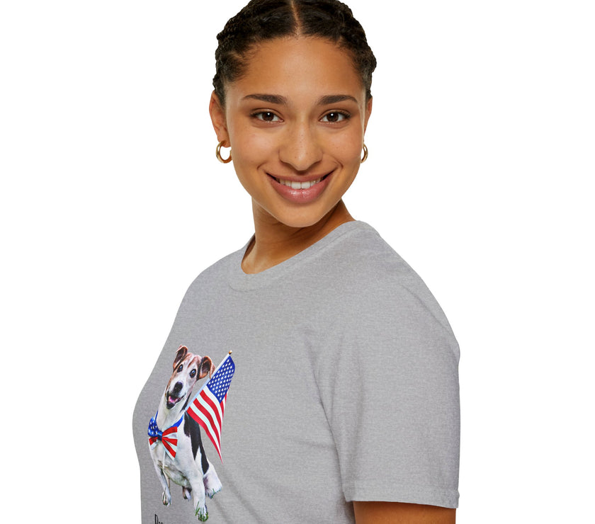 Female wearing T-shirt featuring a cute  puppy wearing an American flag bow tie and holding a small U.S. flag, with the phrase 'Born to Be Free' printed below the image.
