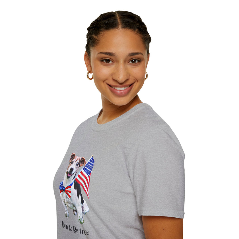 Female wearing T-shirt featuring a cute  puppy wearing an American flag bow tie and holding a small U.S. flag, with the phrase 'Born to Be Free' printed below the image.