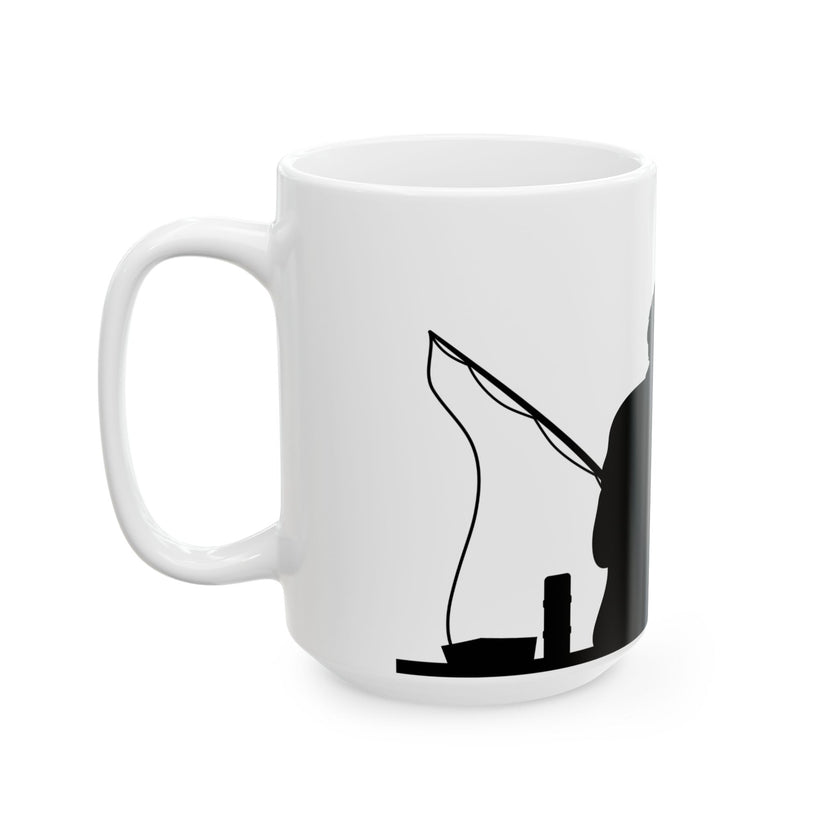 White ceramic mug featuring a silhouette of a child holding a fishing rod next to an adult figure, with the words "Happy Father's Day" in gold script above—an ideal gift for dads who love fishing and family time.