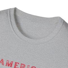  T-shirt (collar view) featuring an American flag graphic with the words 'AMERICAN DREAM' in red and blue text above and below the flag