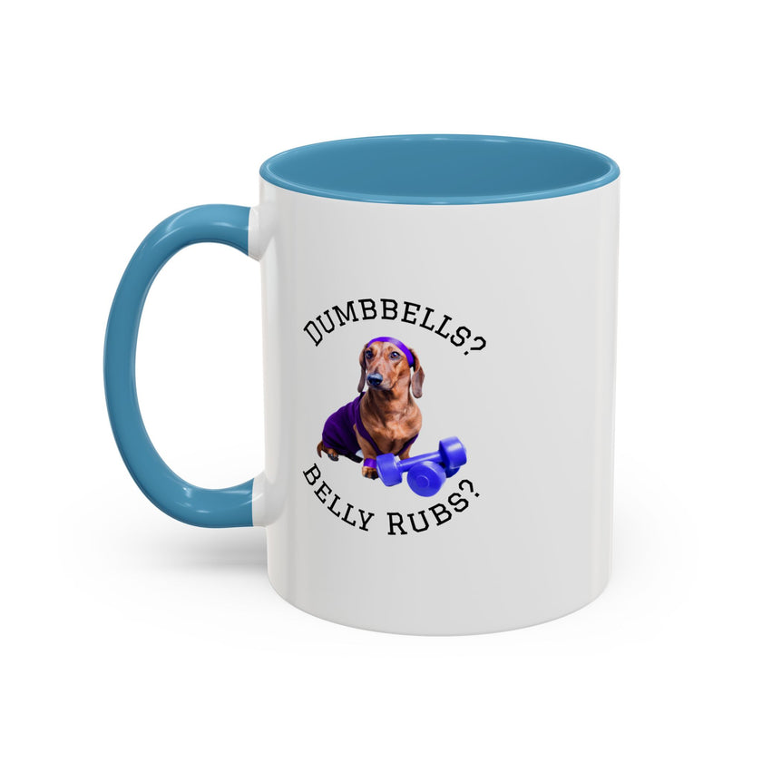 Two tone ceramic mug featuring a dachshund next to dumbbells and the humorous text 'Dumbbells? Belly Rubs?', designed for dog lovers and fitness enthusiasts.