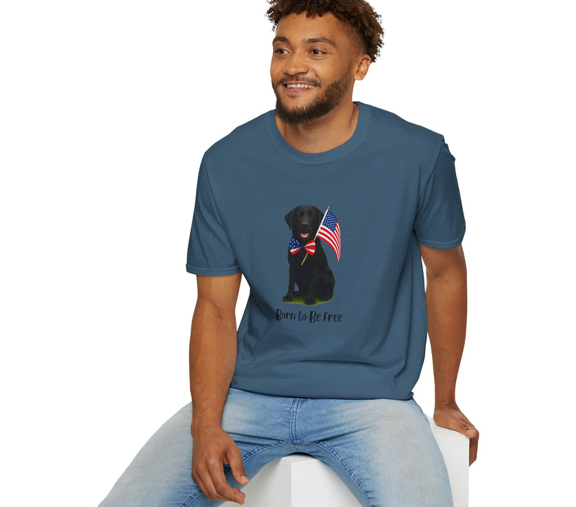 Indigo Blue t-shirt featuring a patriotic Black Lab wearing an American flag bowtie and holding U.S. flags, with the Black Labphrase "Born to Be Free" printed below — perfect for dog lovers and patriotic Americans.