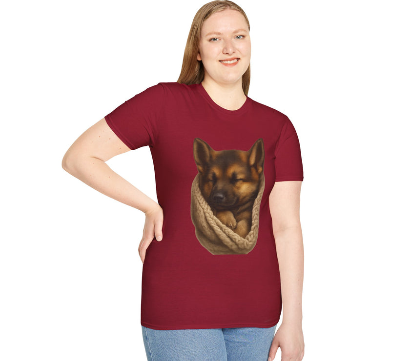 Person wearing a maroon t-shirt with a graphic of a dog in a sling on a white background