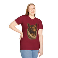 Person wearing a maroon t-shirt with a graphic of a dog in a sling on a white background