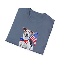 Folded T-shirt featuring a cute  puppy wearing an American flag bow tie and holding a small U.S. flag, with the phrase 'Born to Be Free' printed below the image.