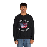 Person wearing a black sweatshirt with 'Proud to be an American' text and an American flag design on a white background.