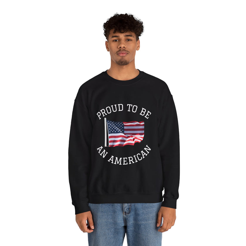 Person wearing a black sweatshirt with 'Proud to be an American' text and an American flag design on a white background.