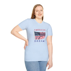 Female wearing T-shirt featuring an American flag graphic with the words 'AMERICAN DREAM' in red and blue text above and below the flag