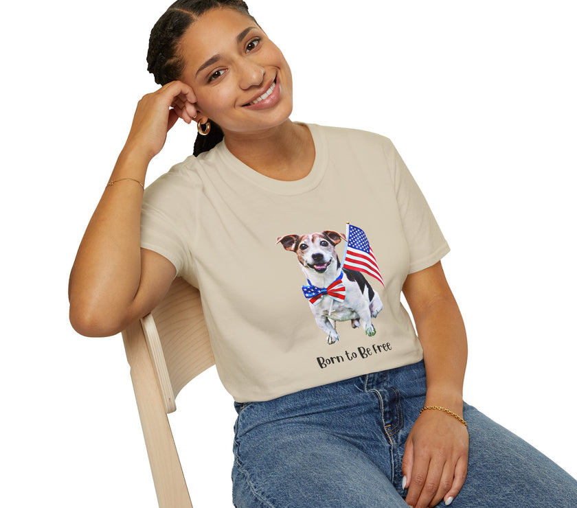 Female wearing T-shirt featuring a cute  puppy wearing an American flag bow tie and holding a small U.S. flag, with the phrase 'Born to Be Free' printed below the image.