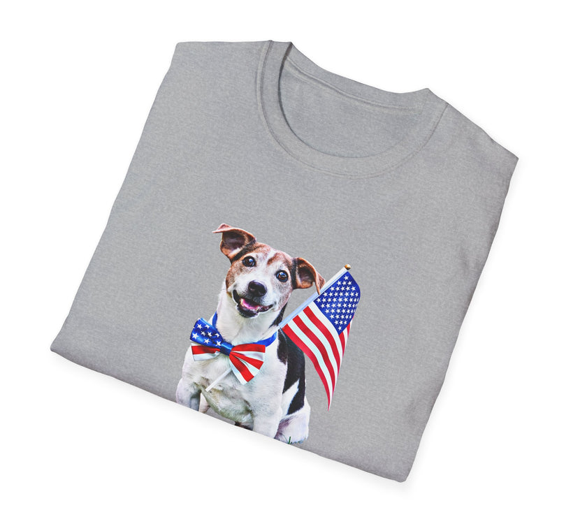 Folded T-shirt featuring a cute  puppy wearing an American flag bow tie and holding a small U.S. flag, with the phrase 'Born to Be Free' printed below the image.