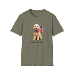 T-shirt featuring a cute golden doodle puppy wearing an American flag bow tie and holding a small U.S. flag, with the phrase 'Born to Be Free' printed below the image.