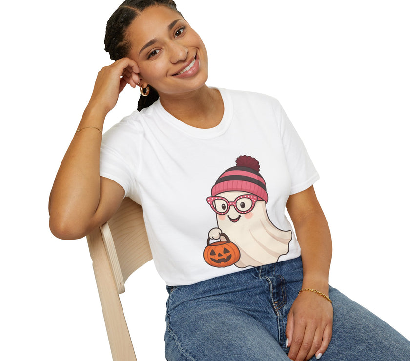 Person wearing a white t-shirt with a ghost graphic design, sitting on a chair against a white background.