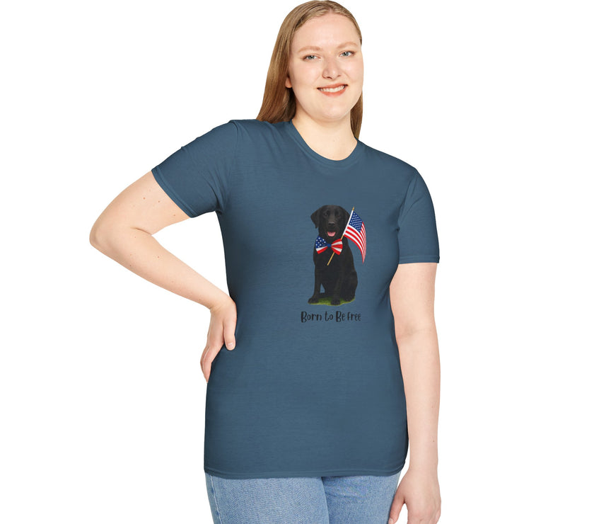 Indigo Blue t-shirt featuring a patriotic Black Lab wearing an American flag bowtie and holding U.S. flags, with the Black Labphrase "Born to Be Free" printed below — perfect for dog lovers and patriotic Americans.